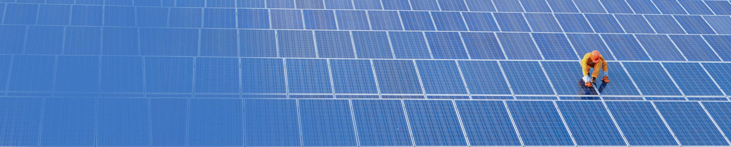 A worker installing a St. Anthony’s Solar Electricity System in Sri Lanka